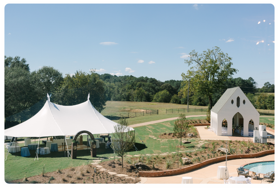 The Oak Hill property with sailcloth tent and white chapel